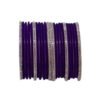 Close-up of elegant purple velvet bangles arranged in a clean geometric composition with soft texture and minimalist contrast background