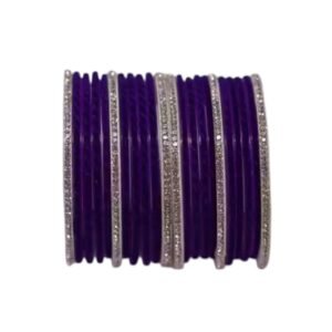 Close-up of elegant purple velvet bangles arranged in a clean geometric composition with soft texture and minimalist contrast background