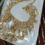 Women's Gold Plated Polki Jewellery Set with Necklace, Earrings & Maangtika photo review