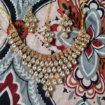 Women's Gold Plated Polki Jewellery Set with Necklace, Earrings & Maangtika photo review