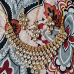 Women's Gold Plated Polki Jewellery Set with Necklace, Earrings & Maangtika photo review