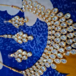 Women's Gold Plated Polki Jewellery Set with Necklace, Earrings & Maangtika photo review
