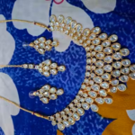 Women's Gold Plated Polki Jewellery Set with Necklace, Earrings & Maangtika photo review